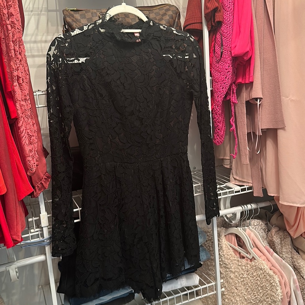 New with tags. Black lace romper